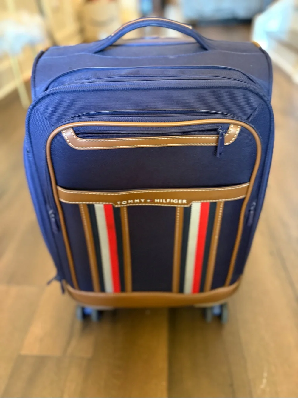Tommy Hilfiger Navy Carry-On Suitcase with Brown Trim and Striped Pocket
